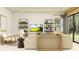 Bright living area with a large window, sliding glass door, and stylish modern decor at 6837 E 115Th St, Palmetto, FL 34221