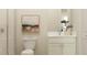 Well-lit bathroom with modern fixtures, including a walk-in shower and stylish vanity at 6905 E 116Th Ct, Palmetto, FL 34221