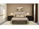 Beautiful bedroom featuring a calming color palette, lamps, and inviting decor at 6905 E 116Th Ct, Palmetto, FL 34221