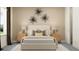 Well-designed bedroom with lamps, floral art, and neutral tones create a serene atmosphere at 6905 E 116Th Ct, Palmetto, FL 34221