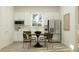 Eat-in kitchen with stainless steel appliances, granite countertops, and ample storage at 6905 E 116Th Ct, Palmetto, FL 34221