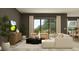 Relaxing living room with comfortable seating and access to outdoor views at 6905 E 116Th Ct, Palmetto, FL 34221