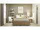 Inviting bedroom featuring a bed, a ladder bookshelf, a workspace, and a window at 6909 E 116Th Ct, Palmetto, FL 34221