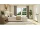 Serene main bedroom with king bed, accent chair, and backyard view through large windows at 6909 E 116Th Ct, Palmetto, FL 34221
