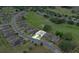 Drone shot of property and neighborhood highlighting its location and proximity to the golf course at 7099 Crested Orchid Dr, Brooksville, FL 34602