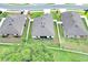 Aerial view of a property with a fenced-in backyard at 7099 Crested Orchid Dr, Brooksville, FL 34602