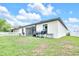 A spacious backyard with a grill, lots of space for fun at 7099 Crested Orchid Dr, Brooksville, FL 34602