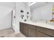 Bathroom vanity with hard surface counters, modern fixtures, and open shelving at 7099 Crested Orchid Dr, Brooksville, FL 34602