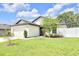Well-manicured front yard and landscaped garden at 7099 Crested Orchid Dr, Brooksville, FL 34602