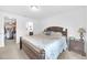 Spacious main bedroom with a walk-in closet and ensuite bathroom offers comfort and convenience at 7099 Crested Orchid Dr, Brooksville, FL 34602