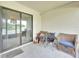 Relaxing patio with an outdoor sitting area for enjoying the serene surroundings at 7099 Crested Orchid Dr, Brooksville, FL 34602