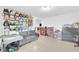 Playroom with tiled floors, neutral paint, and ample toy storage at 7099 Crested Orchid Dr, Brooksville, FL 34602
