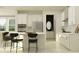 Modern kitchen with breakfast bar, stainless steel appliances, and ample counter space at 7524 E 116Th St, Palmetto, FL 34221