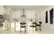 Contemporary kitchen with stainless steel appliances, breakfast bar, and an open floor plan at 7524 E 116Th St, Palmetto, FL 34221