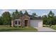 Beautiful one-story home featuring stone accents, a gray roof, an attached two-car garage, and a well-maintained lawn at 7537 E 116Th St, Palmetto, FL 34221