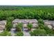 Charming townhomes with parking in front of each unit, surrounded by lush landscaping at 8132 Stone Path Way, Tampa, FL 33647
