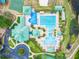 Aerial view of the beautiful resort-style neighborhood pool with tanning and lounging areas at 8132 Stone Path Way, Tampa, FL 33647