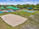 Community amenities including volleyball court, pool and playground at 8208 Pinewood Run Ct, Tampa, FL 33647