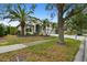 Charming one-story home with well-maintained landscaping, basketball hoop, and a three-car garage at 8208 Pinewood Run Ct, Tampa, FL 33647