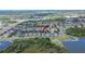 Aerial view of home with a lake view in a beautiful residential neighborhood at 9023 Sienna Moss Ln, Riverview, FL 33578