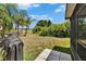 Backyard featuring a large grill, green space, and mature trees at 9023 Sienna Moss Ln, Riverview, FL 33578