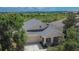 Exterior shot of a well-maintained home with attached garage and manicured front yard at 9023 Sienna Moss Ln, Riverview, FL 33578