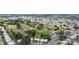 Overhead view of a golf course community showcasing lush green fairways, manicured lawns, and residential areas at 9743 36Th N Way # 4, Pinellas Park, FL 33782
