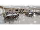 The clubhouse interior boasts ample tables and chairs for residents to enjoy community events and gatherings at 9743 36Th N Way # 4, Pinellas Park, FL 33782