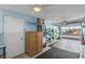 Garage with storage including cabinets, kayaks, generator, and golf cart at 9743 36Th N Way # 4, Pinellas Park, FL 33782
