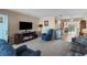 Cozy living room features a fireplace and comfortable seating for relaxation at 9743 36Th N Way # 4, Pinellas Park, FL 33782