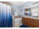 Well-appointed bathroom with double sink vanity, a soaking tub, and a separate shower at 10626 Laguna Plains Dr, Riverview, FL 33578