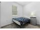 Cozy bedroom with window and carpet at 10626 Laguna Plains Dr, Riverview, FL 33578