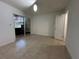 Bedroom features neutral walls and tile flooring throughout at 11201 122Nd Ave # 103, Largo, FL 33778