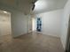 Spacious bedroom features neutral walls and tile flooring at 11201 122Nd Ave # 103, Largo, FL 33778