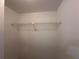 This is a walk-in closet with white walls and wire shelving at 11201 122Nd Ave # 103, Largo, FL 33778