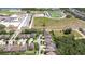 An aerial view of a neighborhood near a school with baseball and football field at 11205 Lark Landing Ct, Riverview, FL 33569