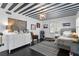 Teen bedroom featuring dark wood floors, striped ceiling, a large dresser and natural light from a window at 1207 S Druid Ln, Tampa, FL 33629