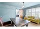 Well-lit office space with a rustic sliding barn door, creating a warm and inviting atmosphere at 1207 S Druid Ln, Tampa, FL 33629