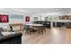 Finished basement with living area, bar, and fun foosball table is ideal for entertaining guests at 1207 S Druid Ln, Tampa, FL 33629