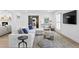 Spacious living room boasts a comfortable sectional, stylish decor, and hardwood floors at 1207 S Druid Ln, Tampa, FL 33629