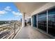 Spacious balcony with seating area, offering panoramic views of the city skyline and waterway at 1209 E Cumberland Ave # 2006, Tampa, FL 33602
