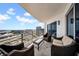 Relaxing balcony seating area provides stunning cityscape and water views for enjoying the outdoors at 1209 E Cumberland Ave # 2006, Tampa, FL 33602