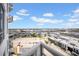 Expansive balcony view overlooking the waterfront and downtown area, with blue skies and white clouds at 1209 E Cumberland Ave # 2006, Tampa, FL 33602