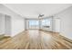 Spacious living area with hardwood flooring, light walls, and large windows, filling the space with natural light at 1209 E Cumberland Ave # 2006, Tampa, FL 33602