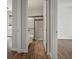 Bathroom featuring wood-look floors and a tiled shower stall at 12256 Creek Preserve Dr, Riverview, FL 33579