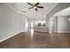 Open-concept living room with hardwood floors and recessed lighting at 12256 Creek Preserve Dr, Riverview, FL 33579