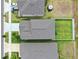 Aerial view of neighborhood homes showing rooflines and spacious fenced backyards at 12715 Maple Bonsai Dr, Riverview, FL 33579