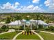 Beautifully landscaped community pool area with palm trees, perfect for relaxation and recreation at 12715 Maple Bonsai Dr, Riverview, FL 33579