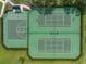 Aerial view highlighting community tennis and basketball courts for active recreation and social activities at 12715 Maple Bonsai Dr, Riverview, FL 33579