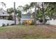 Backyard with a white fence and patio that has a charming pergola at 138 69Th N Ave, St Petersburg, FL 33702